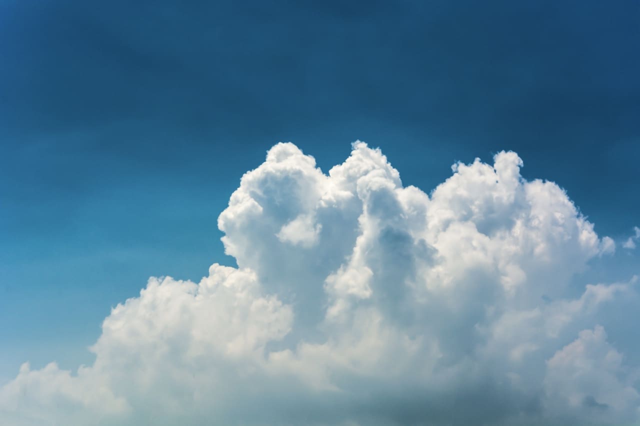 fluffy-clouds-blue-sky